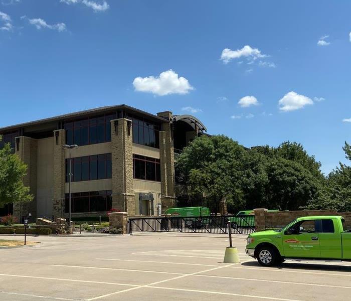 SERVPRO vehicles at commercial building